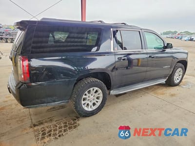 Trzecie zdjęcie samochodu z tyłu: 2015 GMC YUKON XL K1500 SLT VIN:1GKS2HKC6FR203346 - miniatura