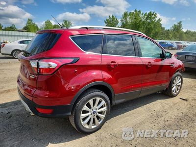 Trzecie zdjęcie samochodu z tyłu: 2017 FORD ESCAPE TITANIUM VIN:1FMCU9J93HUD48071 - miniatura