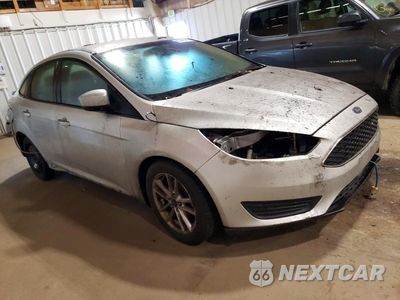 Czwarte zdjęcie samochodu z boku: 2018 FORD FOCUS SE VIN:1FADP3F2XJL329107 - miniatura