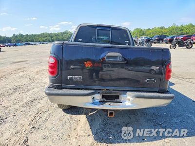 Zdjęcie 11 z 26 samochodu: 2001 FORD F150 SUPERCREW VIN:1FTRW07L41KE22364 - miniatura