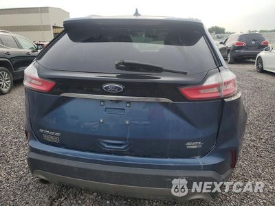 Zdjęcie 6 z 14 samochodu: 2019 FORD EDGE SEL VIN:2FMPK4J90KBB21542 - miniatura
