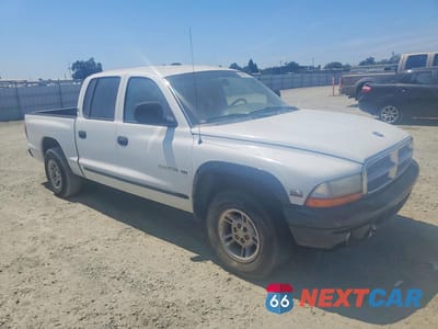 Czwarte zdjęcie samochodu z boku: 2000 DODGE DAKOTA QUAD VIN:1B7GL2AZ4YS672495 - miniatura