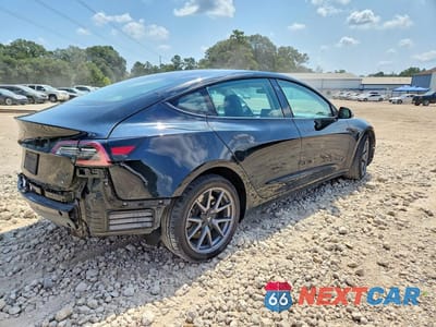 Trzecie zdjęcie samochodu z tyłu: 2022 TESLA MODEL 3 VIN:5YJ3E1EA2NF370218 - miniatura