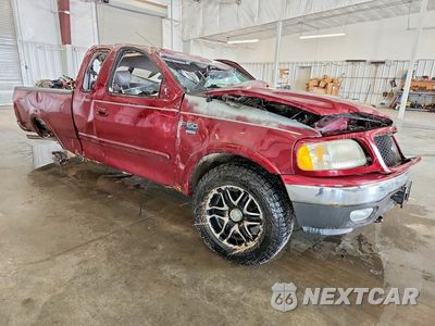 Czwarte zdjęcie samochodu z boku: 2003 FORD F150 VIN:1FTRX18L23NA62174 - miniatura