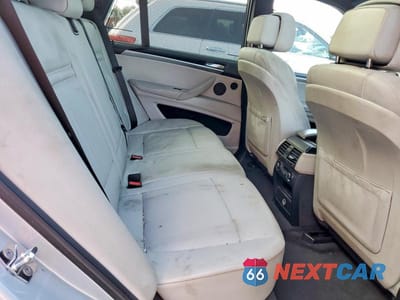 Zdjęcie 11 z 13 samochodu: 2010 BMW X5 M VIN:5YMGY0C58ALK25448 - miniatura