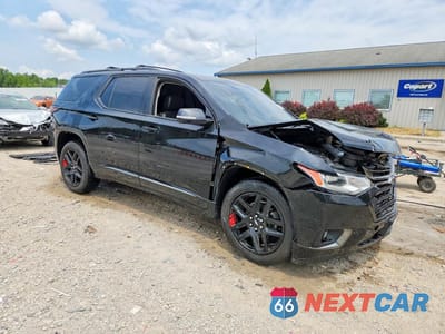 Czwarte zdjęcie samochodu z boku: 2020 CHEVROLET TRAVERSE PREMIER VIN:1GNERKKW4LJ226783 - miniatura