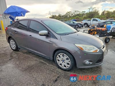 Czwarte zdjęcie samochodu z boku: 2012 FORD FOCUS SE VIN:1FAHP3F27CL187481 - miniatura