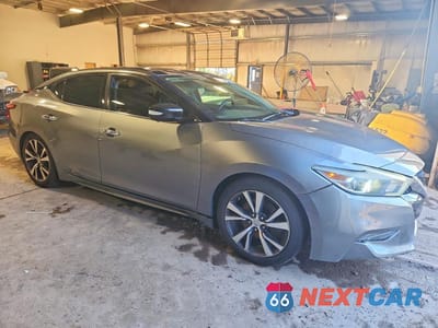 Czwarte zdjęcie samochodu z boku: 2016 NISSAN MAXIMA PLATINUM VIN:1N4AA6AP5GC397431 - miniatura