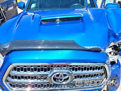 Zdjęcie 11 z 12 samochodu: 2016 TOYOTA TACOMA TRD SPORT VIN:5TFCZ5AN8GX037857 - miniatura