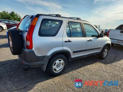 Trzecie zdjęcie samochodu z tyłu: 2002 HONDA CR-V LX VIN:JHLRD78472C021881 - miniatura