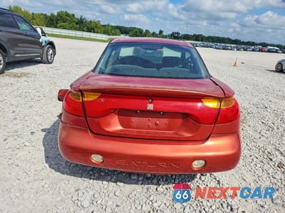 Zdjęcie 6 z 13 samochodu: 2002 SATURN SC2 VIN:1G8ZY12732Z242452 - miniatura