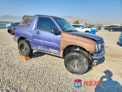Czwarte zdjęcie samochodu z boku: 1999 CHEVROLET TRACKER VIN:2CNBJ18C3X6906067 - miniatura