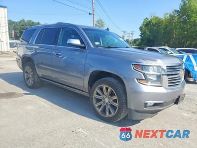 Czwarte zdjęcie samochodu z boku: 2018 CHEVROLET TAHOE K1500 PREMIER VIN:1GNSKCKC1JR300551 - miniatura