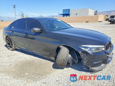 Czwarte zdjęcie samochodu z boku: 2018 BMW M550XI VIN:WBAJB9C53JB035077 - miniatura