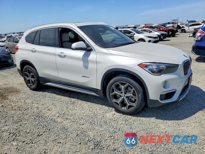 Czwarte zdjęcie samochodu z boku: 2018 BMW X1 SDRIVE28I VIN:WBXHU7C39J5H44602 - miniatura