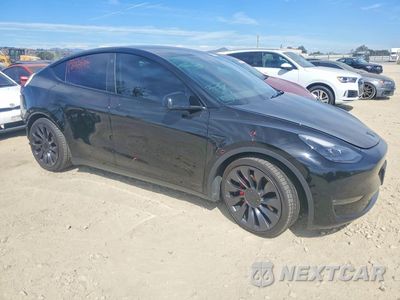 Czwarte zdjęcie samochodu z boku: 2021 TESLA MODEL Y VIN:5YJYGDEF6MF301754 - miniatura