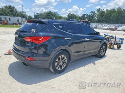 Trzecie zdjęcie samochodu z tyłu: 2014 HYUNDAI SANTA FE SPORT 2.4L VIN:5XYZU3LB4EG169451 - miniatura