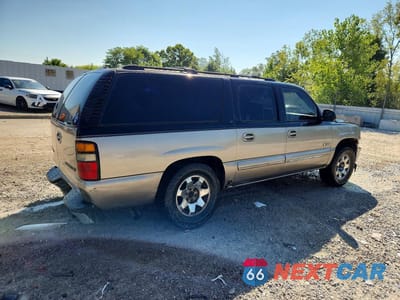 Trzecie zdjęcie samochodu z tyłu: 2001 CHEVROLET SUBURBAN C1500 VIN:3GNEC16T01G107025 - miniatura