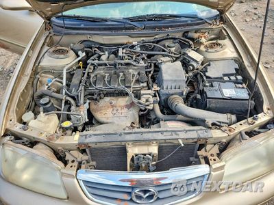 Zdjęcie 11 z 12 samochodu: 2001 MAZDA 626 ES VIN:1YVGF22C415221924 - miniatura