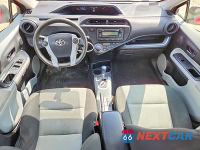 Zdjęcie 8 z 12 samochodu: 2014 TOYOTA PRIUS C TWO VIN:JTDKDTB31E1072817 - miniatura