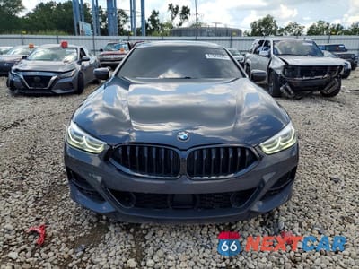 Piąte zdjęcie samochodu w środku: 2022 BMW M850XI VIN:WBAGV8C09NCH81908 - miniatura