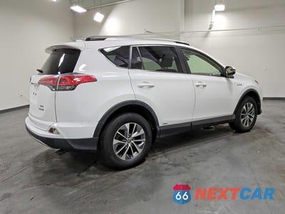 Trzecie zdjęcie samochodu z tyłu: 2018 TOYOTA RAV4 HYBRID XLE VIN:JTMRJREV6JD192614 - miniatura