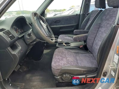 Zdjęcie 7 z 13 samochodu: 2004 HONDA CR-V LX VIN:JHLRD78494C032593 - miniatura