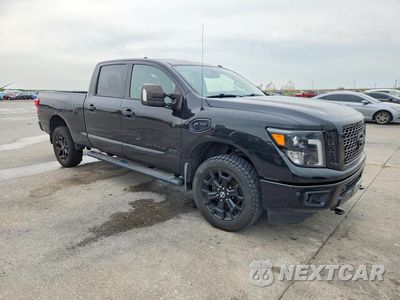 Czwarte zdjęcie samochodu z boku: 2019 NISSAN TITAN XD SV VIN:1N6BA1F48KN518088 - miniatura