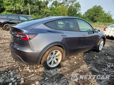 Trzecie zdjęcie samochodu z tyłu: 2021 TESLA MODEL Y VIN:5YJYGDEE3MF075745 - miniatura