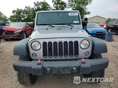 Piąte zdjęcie samochodu w środku: 2015 JEEP WRANGLER UNLIMITED SPORT VIN:1C4BJWDG0FL523171 - miniatura