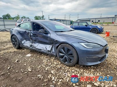 Czwarte zdjęcie samochodu z boku: 2022 TESLA MODEL S VIN:5YJSA1E51NF473110 - miniatura