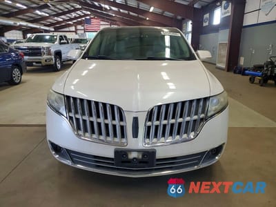 Piąte zdjęcie samochodu w środku: 2012 LINCOLN MKT VIN:2LMHJ5AT4CBL50207 - miniatura