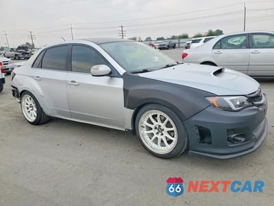 Czwarte zdjęcie samochodu z boku: 2011 SUBARU IMPREZA WRX VIN:JF1GV7F61BG512208 - miniatura