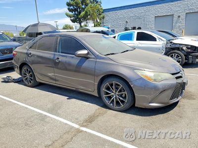 Czwarte zdjęcie samochodu z boku: 2015 TOYOTA CAMRY XSE VIN:4T1BF1FKXFU013907 - miniatura
