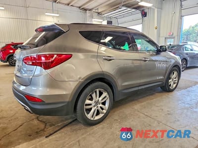 Trzecie zdjęcie samochodu z tyłu: 2013 HYUNDAI SANTA FE SPORT 2.0T VIN:5XYZUDLA8DG012307 - miniatura
