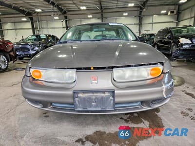 Piąte zdjęcie samochodu w środku: 2001 SATURN SL VIN:1G8ZF52891Z272642 - miniatura