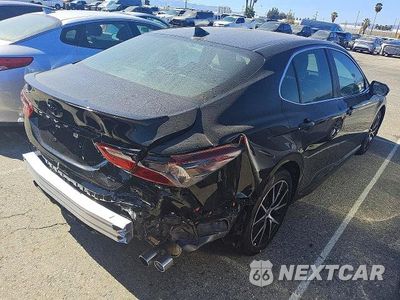Trzecie zdjęcie samochodu z tyłu: 2024 TOYOTA CAMRY SE VIN:4T1G11AK0RU865778 - miniatura