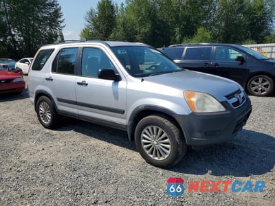 Czwarte zdjęcie samochodu z boku: 2002 HONDA CR-V LX VIN:JHLRD68432C009642 - miniatura