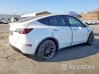 Trzecie zdjęcie samochodu z tyłu: 2023 TESLA MODEL Y VIN:7SAYGDED0PF979261 - miniatura