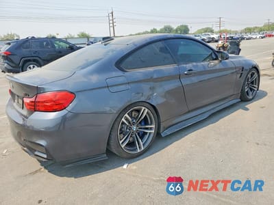 Trzecie zdjęcie samochodu z tyłu: 2018 BMW M4 VIN:WBS4Y9C53JAG66718 - miniatura