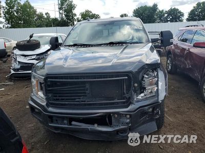 Piąte zdjęcie samochodu w środku: 2018 FORD F150 SUPERCREW VIN:1FTFW1E57JFD56608 - miniatura