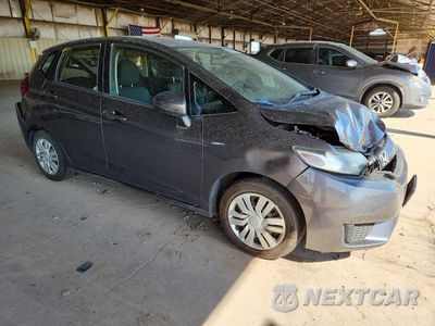 Czwarte zdjęcie samochodu z boku: 2016 HONDA FIT LX VIN:JHMGK5H54GS010369 - miniatura