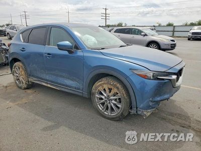 Czwarte zdjęcie samochodu z boku: 2021 MAZDA CX-5 GRAND TOURING VIN:JM3KFBDM3M0380058 - miniatura