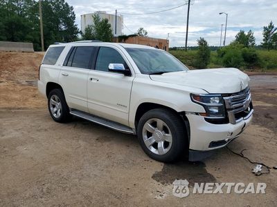 Czwarte zdjęcie samochodu z boku: 2015 CHEVROLET TAHOE K1500 LTZ VIN:1GNSKCKC7FR123351 - miniatura