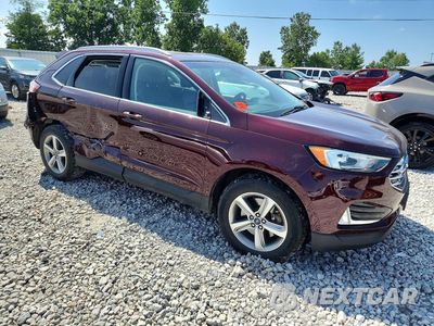 Czwarte zdjęcie samochodu z boku: 2019 FORD EDGE VIN:2FMPK4J95KBC26660 - miniatura