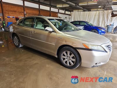 Czwarte zdjęcie samochodu z boku: 2007 TOYOTA CAMRY HYBRID VIN:JTNBB46K273011525 - miniatura