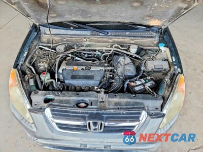 Zdjęcie 12 z 13 samochodu: 2002 HONDA CR-V EX VIN:JHLRD78832C076458 - miniatura