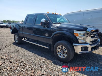 Czwarte zdjęcie samochodu z boku: 2014 FORD F350 SUPER DUTY VIN:1FT8W3BT0EEB57001 - miniatura