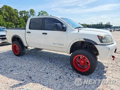Czwarte zdjęcie samochodu z boku: 2011 NISSAN TITAN SV VIN:1N6BA0EC3BN316889 - miniatura