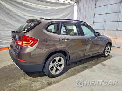 Trzecie zdjęcie samochodu z tyłu: 2013 BMW X1 SDRIVE28I VIN:WBAVM1C50DVW43297 - miniatura